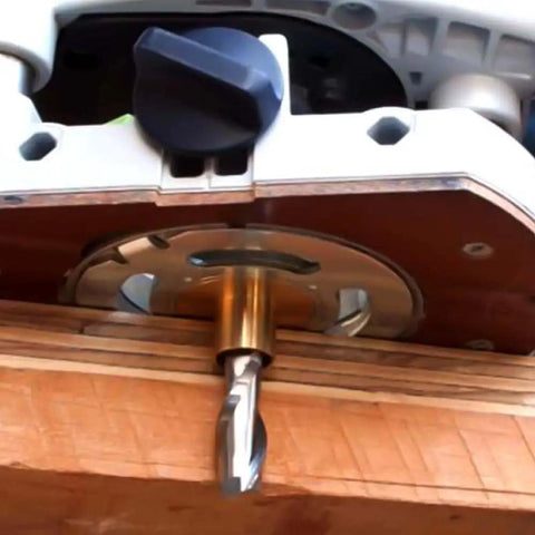 Pro Grade Router Template Guide Set Featuring Precise Metal Bushings mounted on a router, showing brass bushing and bit.