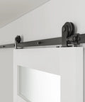 6 Ft Sliding Barn Door Hardware Kit With Heavy Duty Track System installed on a white door with rollers and spliced rails