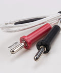 Two K-type thermocouple temperature sensors with red and black handles, white braided leads, metal probes and mini connectors.