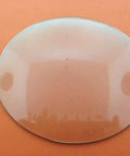 Replacement Round Convex Clock Glass Nine And A Half Inch 241 Mm for DIY Clock Assembly Kit, shown on orange background