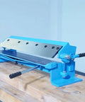 Box And Pan Brake Sheet Metal Folder For 24 Inch Capacity, 20 Gauge Mild Steel on wooden table