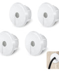 4 Pack 1 Inch Wall Cable Pass Through Grommets, Plastic Feed Through Bushings For Cables And Wires, White, with installed view on wood surface