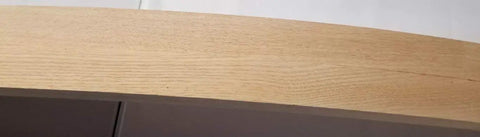 Close-up of unfinished solid red oak wood, showcasing a smooth, curved edge for Pair Of Steam Bent Solid Red Oak Rocker Runners For Top Shelf Furniture Fix Ups And No Nonsense DIY Upgrades Unfinished Underswing Parts With Precise Drill Specs.