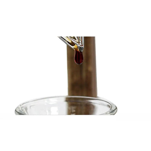 Kickback Ready Dutch Cold Brew Coffee Maker 1500ml Wooden Tower Iced Coffee Pitcher dripping brewed coffee into glass basin.