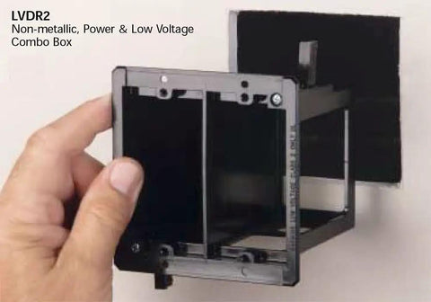 Hand installing Two Gang Cut In Electrical Power And Low Voltage Old Work Combo Box for existing construction