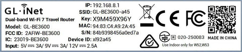 Label showing specifications of Dual Band WiFi 7 Travel Router With 2.5G Ethernet Ports and USB 3.0, including model and serial numbers.