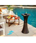 Decorative Glass Table Torch With Durable Fiberglass Wick And Metal Snuffer Creates Cozy Ambience For Dining Or Desk Decor Burns Up To Six Hours Per Fill A Thoughtful Holiday Gift For Family And Friends near poolside seating area.