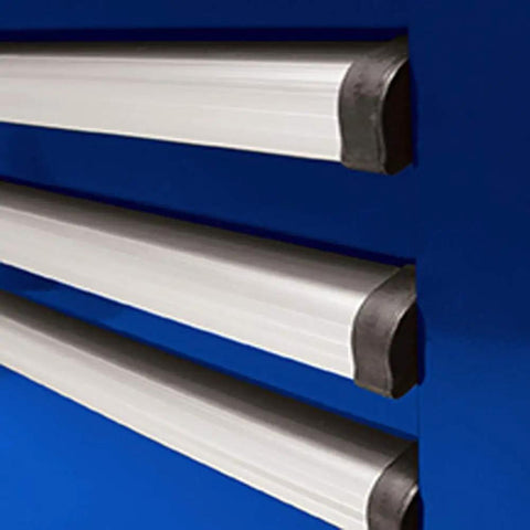 Close-up of aluminum pulls on a 36 Inch 8 Drawer Blue Top Chest With Full Extension Ball Bearing Slides Gas Struts EVA Drawer Liners And Top Mat.