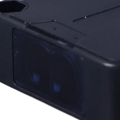 Close-up of Indoor Wall Mounted Retroreflective Photoelectric Sensor With 1.8m Cable for precise target detection in industrial use.