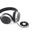 Premium Closed Back Studio Headphones Featuring 40Mm Rare Earth Drivers deliver clear audio, shown in black with 1/8 to 1/4 connector.