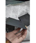 Hand holding Ultra Pure Graphite Plate Block Sheet Pro Grade 99.99 Percent High Purity Electrode Grade Graphite 3x100x100 mm