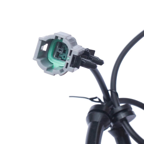 Close-up view of grey and green connector from Front Wheel Bearing And Hub Assembly For RWD Nissan Frontier 2005-2018 with ABS.
