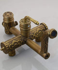 Heavy Duty Solid Brass Shower System Featuring Eight Inch Rainfall Head And Detachable Handheld Sprayer Lead Free Wall Mounted Bath Faucet Rock Solid Build ornamental brass faucet with intricate design and multiple knobs.