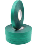 Four green plant tie tape rolls 6 mil thick half inch wide 200 feet each, stacked for large tapeners and tie guns, securing vines and trees.