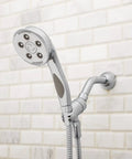 Premium Handheld Shower Head With AnyStream 360° Technology mounted in a bathroom on white tile wall.