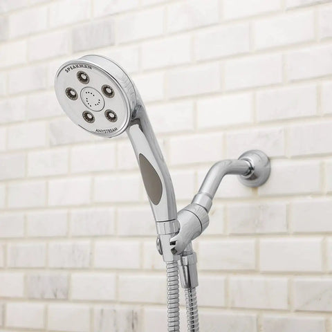 Premium Handheld Shower Head With AnyStream 360° Technology mounted in a bathroom on white tile wall.