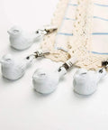 Cast Iron Tablecloth Weights 4 Pack With White Bird Pendant Clips Heavy Duty Tablecloth Clamps For Home Garden Parties Weddings Camping And Picnics Keeps Your Linen Flat And Secure, showing bird-shaped clips on lace and checked cloth.