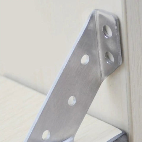 Heavy Duty Stainless Steel Corner Brace Angles For Wood Furniture 6 Pack Right Angle Brackets For Shelves DIY Friendly Tables Cabinets Easy Install Triangular L Brackets Sturdy Silver showing installed bracket on wood