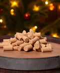 25 Pack Natural Soft Wood Corks, Tapered Bottle Stoppers for Wine Making displayed on a wooden barrel with festive backdrop