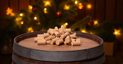 25 Pack Natural Soft Wood Corks, Tapered Bottle Stoppers for Wine Making displayed on a wooden barrel with festive backdrop