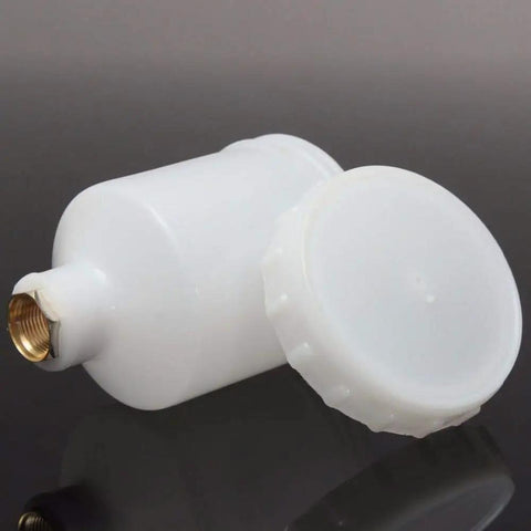 Heavy Duty 125 Ml Paint Cup For HVLP Spray Guns And Airbrushes with threaded metal coupling and white plastic body.