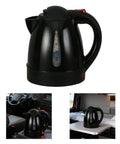 RigReady 24V 250W Portable Electric Kettle For Trucks And Rv Quick Heat Water Heater No Fuss Auto Shutoff 1 Liter on a console surface.