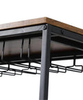 Close-up view of the rustic wood top and black metal frame of the Slick Two Tier Rolling Bar Cart With Black Metal Frame And Rustic Wood Accents.