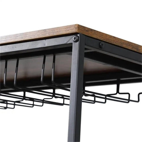 Close-up view of the rustic wood top and black metal frame of the Slick Two Tier Rolling Bar Cart With Black Metal Frame And Rustic Wood Accents.