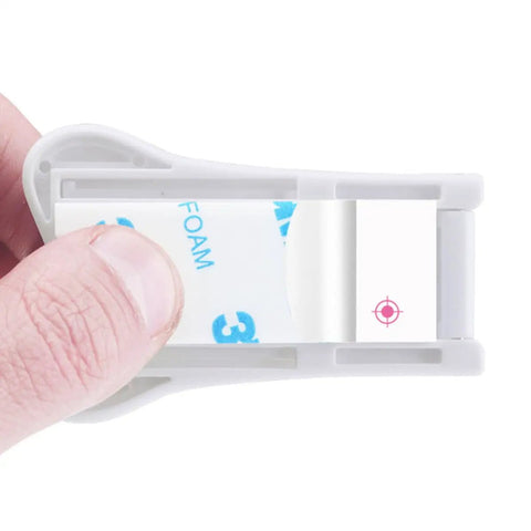 Close-up of Six Pack Childproof Window And Cabinet Safety Locks with Keyless Design, white ABS, adhesive strip being applied