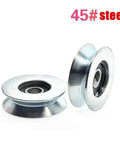 Industrial Grade V Groove Wheel 12 X 58 X 18 Millimeter Carbon Steel U Channel Roller For Wire Cable Systems, two wheels viewed from the side.