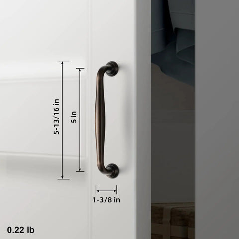 Oil Rubbed Bronze Cabinet Pulls with 5 Inch Hole Centers, shown on white cabinet, displays spindle style and deep antique warm finish