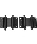 Black double action self closing door hinges with visible mounting holes, suitable for cafe and saloon doors, adjustable tension.