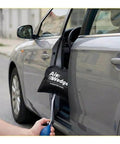 Inflatable Air Wedge Bag Pump With Medium Shim And Leveling Tool, Heavy Duty Pro Grade Ballistic Nylon Air Jack For Window Installation, Door Alignment, And Home Use, Damage Free Precision For Gap Control And Safe, Sturdy Support in use for car door alignment.