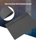 Top Shelf Anti Static Soldering Mat With ESD Safe Silicone Surface, grey repair pad showing elasticity and design for tech work.