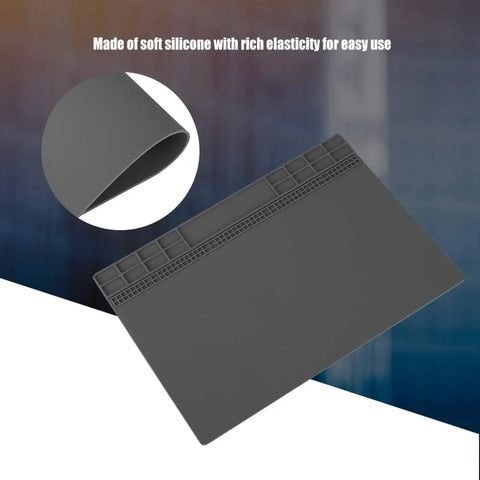 Top Shelf Anti Static Soldering Mat With ESD Safe Silicone Surface, grey repair pad showing elasticity and design for tech work.