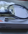 Keyence FU-57TZ Fiber Optic Sensor Cable on box, includes connector and packaging for industrial automation, pro-grade durable cable