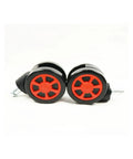 Close-up of 60mm Furniture And Office Chair Casters Set, car wheel style with black and red colors, light blue stem not visible.