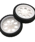 Close-up of Two wheels from Four Pack Rubber Wheel Set For TT Motors With Encoders Dope High Speed Car Wheels Replacement Parts For Gearbox Motors 200 RPM Ratio 1 To 48 Shaft 15 By 65 mm For DIY Arduino Projects, showing white hubs and black rubber treads.