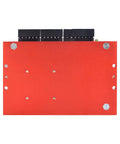 Stepper driver module, red metal enclosure with black terminal blocks on top.