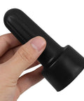 Hand holding black Nonslip Socket Ring Removal Tool For E14 E26 E27 G9 Lamps No Sweat Install Easy Lamp Shade Retaining Ring Wrench