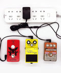 Pro Grade Guitar Pedal Power Supply Adapter 9V DC 1A 1000mA with Negative Tip Output powering multiple guitar effects pedals