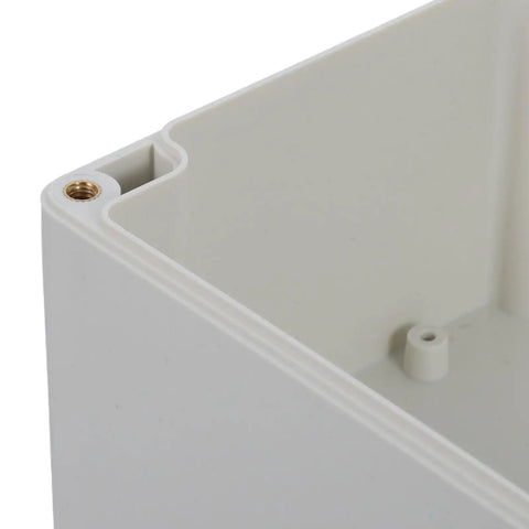 Weatherproof Outdoor Electrical Junction Box With Hinged Cover For Industrial Wiring And Control Systems Plastic Enclosure For No Fuss Tool Free Access Durable All Weather Wiring Box For Equipment Installation And Maintenance, close-up corner