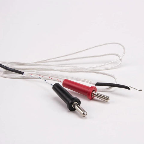 Front view of two K-type thermocouple sensors with red and black handles, braided white cables, stainless-steel tips