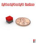 Super Badass N48 Neodymium Cube Magnets 1/4 Inch 6Mm Size beside a penny for size reference.