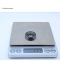 10 Pack Premium 6803 RS Deep Groove Ball Bearings on digital scale showcasing precise 17mm by 26mm size.