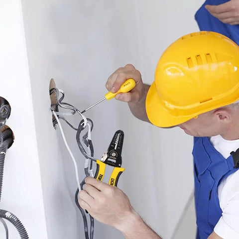 Man using Dead Simple Wire Stripper And Cutter For 22 To 30 AWG Copper Wires on electrical wires with screwdriver.
