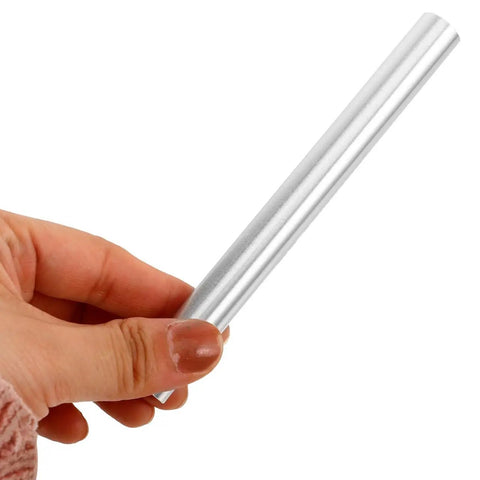 Hand holding a silver aluminum tent pole repair tube from the Lightweight Aluminum Tent Pole Repair Tubes 4 Pack Connectors For Easy On The Fly Fix 5.11 Inch Compact Tent Pole Sleeves Durable Camping Gear Repair Kit For Outdoor Adventures.