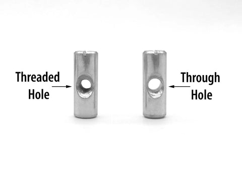 Two precision dowel pins, one with a threaded hole and one with a through hole, for Top Shelf Machinist Block Hardware Kit.