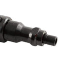 Close-up of the powder actuated fastening tool for drywall tracks and concrete, showing the nozzle for tight space reach.