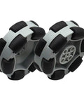 Front view of two 2.5-inch omni wheels with grey hubs and black rollers; 50mm motor compatible.